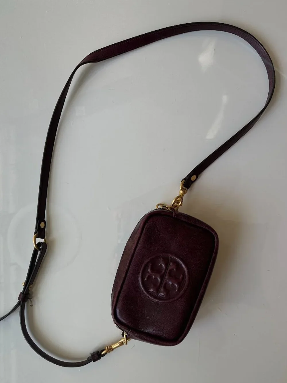 Tory Burch maroon leather crossbody purse with adjustable strap